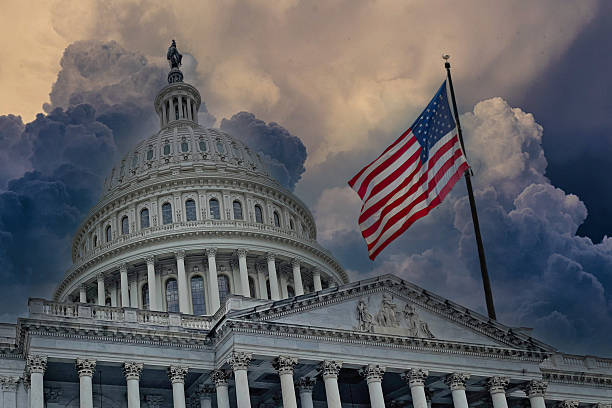 politics washington d.c. capitol building with storm clouds politics washington d.c. capitol building with storm clouds